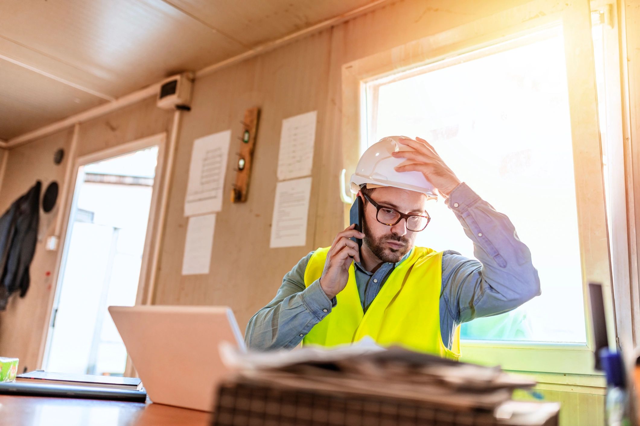 Contractor taking a call to schedule an estimate